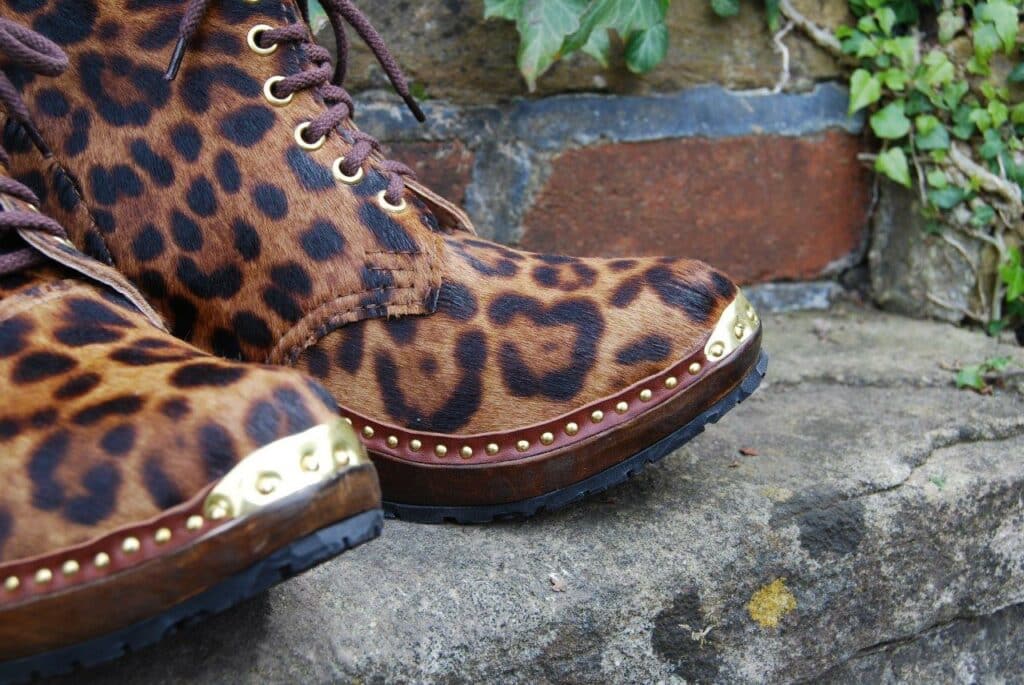 Derby boots in hair-on cowhide with jaguar fur design